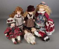 A collection of porcelain dolls including examples from the Leonardo Collection.