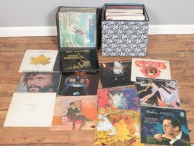 A box and carry case of LP records. Includes Frank Sinatra, Wings, Paul McCartney, Rod Stewart,