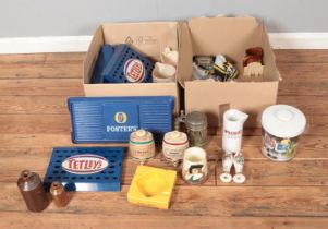 Two boxes of assorted brewriana to include ceramic beer pump handles, whiskey jugs, stoneware, etc.