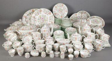 A vast collection of Minton Haddon Hall dinnerwares. Including cup & saucers, teapot, sugar bowls,