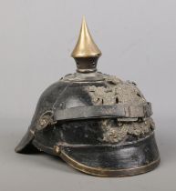 An Imperial German Wurttemberg pickelhaube. Bearing coat of arms and motto Furchtlos Und Trew.
