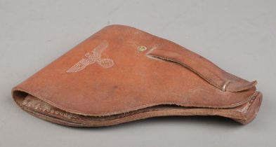 A World War Two French Mab Model D leather gun holster with German capture stamps.