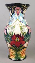 A large Moorcroft pottery vase decorated in the Hidcote pattern by Philip Gibson. Limited edition