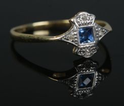 An Art Deco 18ct gold, platinum, sapphire and diamond ring. Size Q. 1.93g.