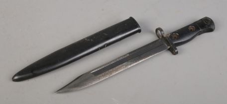 A British L1A3 SLR bayonet with scabbard. Blade length 20cm. CANNOT POST OVERSEAS.