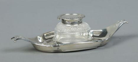 A Victorian silver and glass inkwell on boat shaped stand. Assayed Birmingham 1892 by Samuel