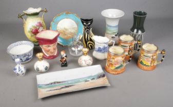 A collection of ceramics including Coalport plate, West German Cat, Highland Stoneware Scotland,