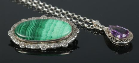 A mid century Robert Allison silver and malachite brooch along with a silver and amethyst pendant on