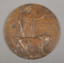 A World War One bronze memorial plaque/death penny awarded to John Small.