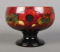 A Moorcroft pottery pedestal bowl decorated in the Flambe Anemone design. Height 12cm.