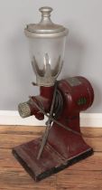 A vintage Hobart electric coffee grinder.