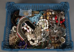A box of costume jewellery. Includes beads, earrings, necklaces, etc.