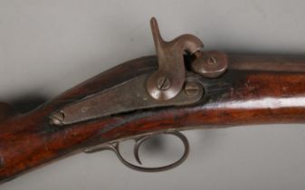 An 19th century heavy percussion rifle with octagonal barrel. Barrel length 72cm. CANNOT POST.
