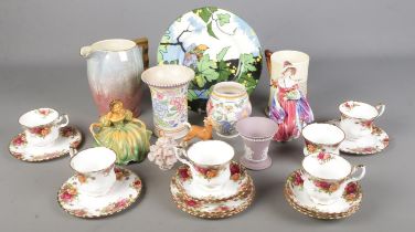 A box of ceramics. Includes Royal Albert Old Country Roses, Royal Doulton Lady figure, Carltonware