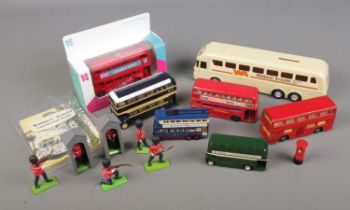 A collection of diecast busses including Dinky, Matchbox and Corgi examples together with Wallace