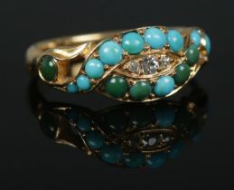 A Victorian gold, turquoise and diamond ring. Tests as 18ct. Size L. 3.76g. Overall good condition.