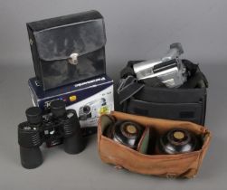 A Panasonic NV-GS75 digital video camera with a Canon G10HI, Opticron binoculars and a cased set