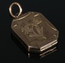 A 9ct gold locket with floral decoration. 3.6g One slight dent to top right corner on front.