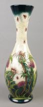 A Moorcroft pottery vase decorated in the Thistledown pattern by Rachel Bishop. Date cypher for