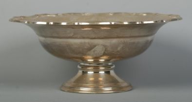 A George V silver pedestal bowl with scalloped edge. Assayed Birmingham 1928 by Barker Brothers