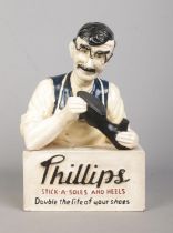 A vintage Phillips advertising model for Stick A Soles And Heels. Made by Beritex. Height 31cm.