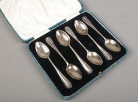 A cased set of six silver teaspoons. Assayed Sheffield 1933 by James Deakin & Sons. 50g