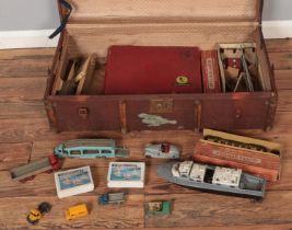 A suitcase of mostly model railway and diecast vehicles. Includes Schuco, Hornby Dublo, Trix Twin