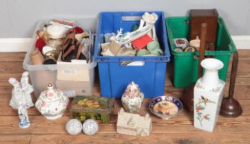 Three boxes of miscellaneous. Includes decorative vase, lawn boules, continental figures, Noritake