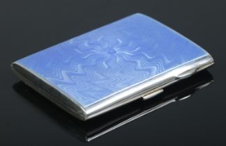 An Art Deco silver and blue guilloche enamel cigarette case. Assayed Birmingham 1929 by Hemming &