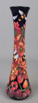 A Moorcroft pottery vase decorated in the Pollinators pattern by Rachel Bishop. Date cypher for