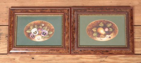 A pair of Marie Graves (Coalport Artist) framed oval still life watercolours. Both signed to the