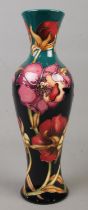 A Moorcroft pottery vase decorated in the Carolina Moon pattern by Kerry Goodwin. Date cypher for