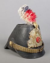 A Prussian leather jager shako bearing coat of arms.