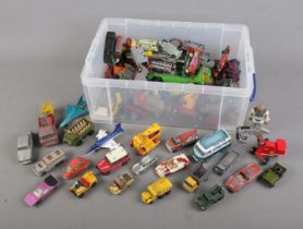 A collection of assorted play worn diecast vehicles to include Corgi, Lesney, Matchbox, etc.
