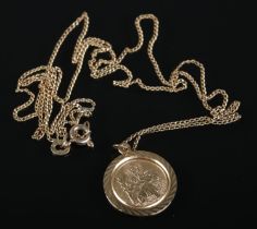 A 9ct gold St Christopher on 9ct gold chain. 3.4g. Chain knotted.