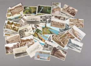 A small collection of vintage travel postcards of mainly photo landscape.