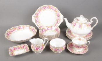 A Royal Albert part tea service in the Serena pattern to include teapot, milk jug, sugar bowl,