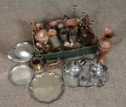 A box of mixed metalwares. Includes candelabra, Swan Brand tea set on tray, copper and brass vessels