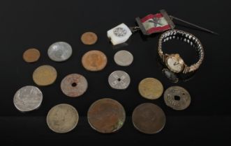 A small selection of coins including a 1799 George III penny, 1853 Victoria penny, 1921 George V