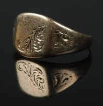 A 9ct gold signet ring with engraved decoration. Size R. 3.4g.