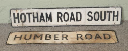 Two painted metal street signs for Humber Road and Hotham Road South.