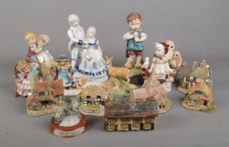 A quantity of collectable figures including Lilliput lane cottages, Leonardo collection animal