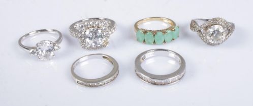 Six silver rings mostly cubic zirconia set examples. Total weight 17.7g.