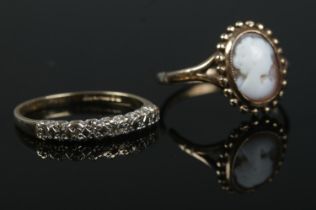 Two 9ct gold ladies rings. Includes nine stone diamond and cameo example. Both size L 1/2. Total