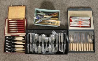 A collection of cutlery including cased set of Cooper Ludlam Cutlery