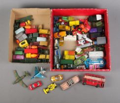 Two boxes of assorted diecast vehicles to include Lesney, Matchbox, Dinky, Corgi, etc.