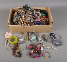 A box containing a good collection of assorted costume jewellery to include necklaces, bangles,