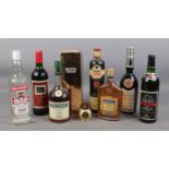 A collection of sealed alcohol. Includes Three Barrels brandy, Martell cognac, Harrods claret,