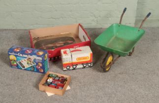 A box of vintage children's toys and games to include Revell Nova Home Racing Kit, Videomaster