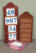 A Hymn board with box of numbers and a similar style board